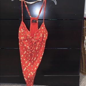 urban outfitters orange bodysuit